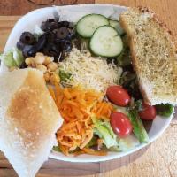 Small Crispelli Salad · house blend lettuce, garbanzo beans, cucumber, carrot, tomato, black olive, parmesan, with r...