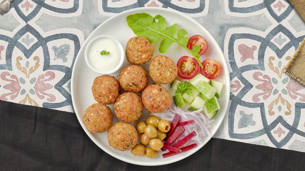 Furious Falafel Appetizer · Baked and fried mixture of garbanzo beans, fava beans, coriander, cumin, parsley and onions. Mezzat