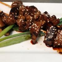 Steak Skewers · 2 sticks worth of Grilled all-natural angus beef, marinated in our house seasonings. Served ...