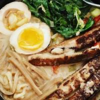 Vegan Ramen · Ramen noodle soup with Veggie broth + coconut bomb, seared tofu, kale, bamboo, scallions & r...