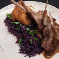 Lamb Rack  · Mint demi glace / Braised red cabbage & bacon / Shallots / Potato croquets