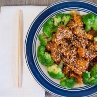 Sesame Chicken · Chunks of fried chicken with sesame sauce. served with broccoli.