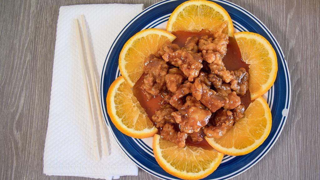 Orange Chicken · Hot and spicy. White meat. Chunks of fried chicken with orange-flavored hot spicy sauce. Served with broccoli.