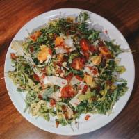 Mountain Salad* · arugula, prosciutto, tomato, parmesan, pine nuts, olive oil, balsamic vinaigrette