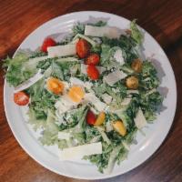 Caesar Salad* · romaine lettuce, parmesan, tomato, creamy Caesar