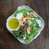 Side Salad · Mixed greens and kale, topped with shaved Parmesan, red cabbage, shredded carrots and crispy...