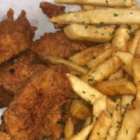 Chicken Strips · Chicken strips with french fries.