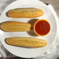Breadsticks (3) · With pasta sauce.