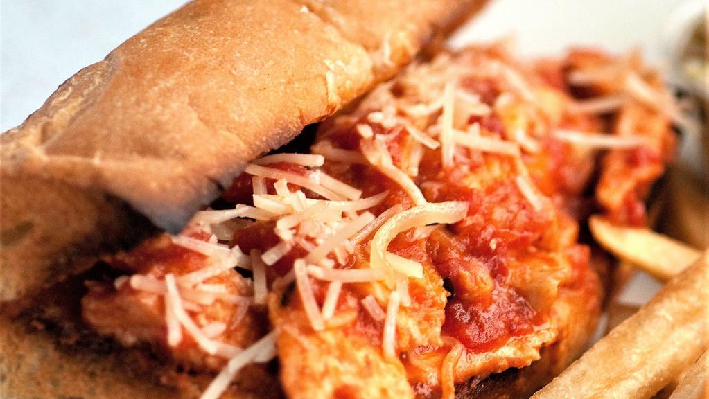 Chicken Parmesan Hoagie · Oven-baked chicken, thinly sliced, covered in our savory marinara sauce, topped with melted mozzarella and freshly shredded Parmesan cheese.