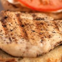 Grilled Chicken Sandwich · 6 oz chicken breast hot off the grill, topped with lettuce, tomato and mayo, served on a toa...