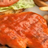 Buffalo Chicken Sandwich · Grilled chicken breast covered with our homemade hot and spicy buffalo sauce, topped with le...