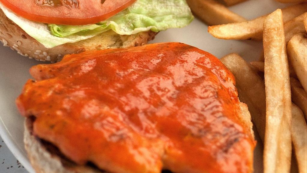 Buffalo Chicken Sandwich · Grilled chicken breast covered with our homemade hot and spicy buffalo sauce, topped with lettuce, tomato and a side of bleu cheese.