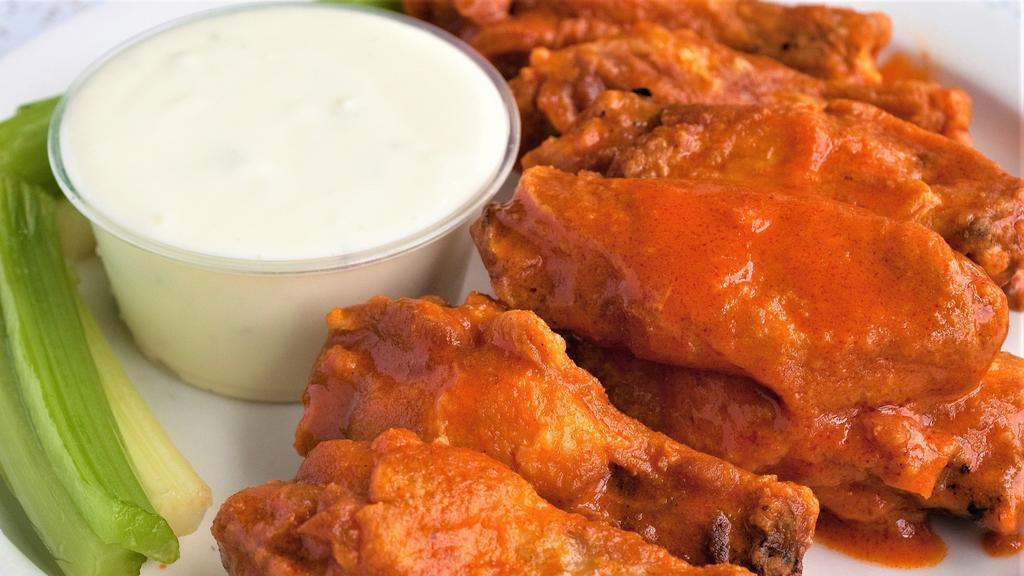 Buffalo Wings · Slathered in our homemade hot and spicy buffalo sauce, served with celery and bleu cheese.