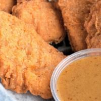 Chicken Strips · Five juicy strips of chicken, breaded and deep fried.