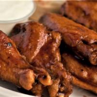 Bbq Wings · Covered in our own honey barbecue sauce, served with celery and ranch.