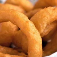 Onion Rings · Big thick-cut onions, beer-battered and deep-fried.