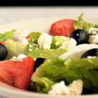 Small Greek Salad · Romaine lettuce, onions, tomatoes, banana peppers and black olives, topped with feta cheese,...