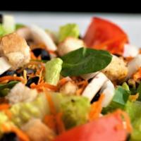 Garden Salad · Mixed lettuce, spinach, tomatoes, onions, green and black olives, mushrooms and green pepper...