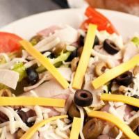 Chef Salad · Mixed lettuce layered with diced turkey and ham, tomatoes, green and black olives, topped wi...