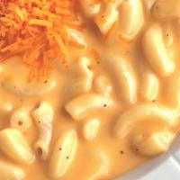 Mac N Cheese · A big ol' bowl of homemade mac n' cheese. Generous amounts of Cheddar, Parmesan, American an...