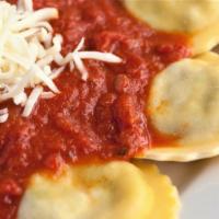 Spinach Portabella Ravioli · Vegetarian ravioli filled with spinach, portabella mushrooms and cheese, covered with your c...