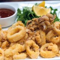 Calamari · Lemon wedge & cocktail sauce. Grilled or fried. Serves 2.