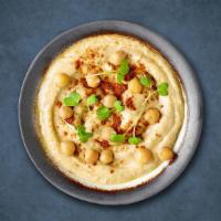 Healthy Hummus · Pureed chickpeas, creamy tahini sauce, garlic, and served with warm pita bread.