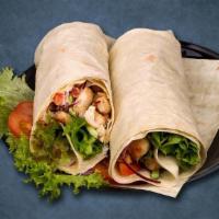 Shredded Chicken Shawarma Wrap · Finely sliced house-seasoned rotisserie chicken with chopped onions, lettuce, tomatoes, cabb...