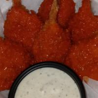 Buffalo Butterfly Shrimp  · eight fried butterfly shrimp tossed in buffalo and served with ranch
