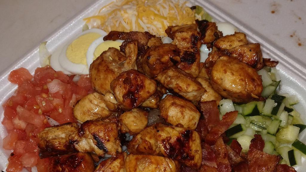 Mai Wai Hibachi Salad · Fresh tossed salad loaded with Carrots, cucumbers, tomatoes, shredded Colby Jack ,egg, onions and croutons and topped with your choice of Chicken, Steak or Shrimp! Served with garlic butter texas toast