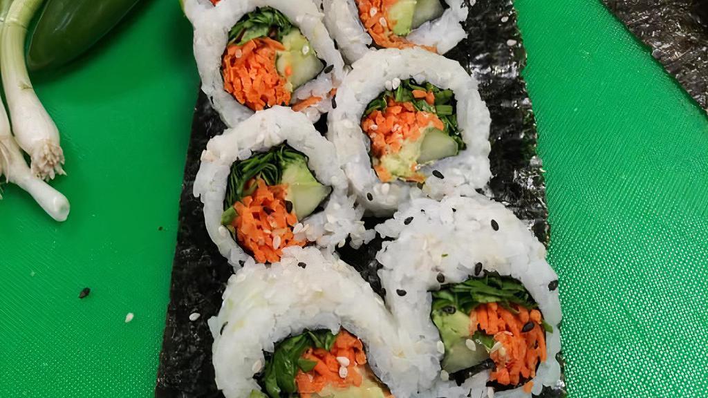 Veggie Roll · Fresh sushi roll stuffed with Leaf lettuce, Cucumber, Carrots, and avocado!