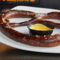Big Twist · One gigantic lightly salted pretzel with our . house beer cheese sauce for dipping.