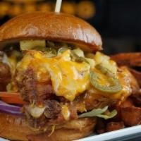 Chi-Town Chicken Mango Habanero · Grilled or Fried Chicken tossed in mango habanero sauce with cheese blend, pineapple, jalape...