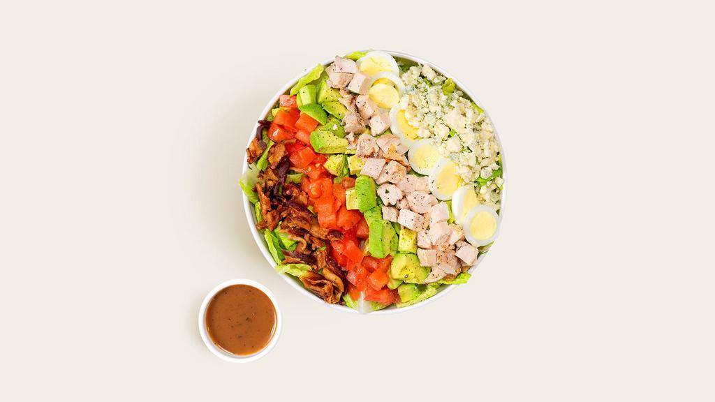 Cobb Salad · Chicken with blue cheese, bacon bits, sliced egg, avocado, tomato, chopped romaine, and balsamic vinaigrette.