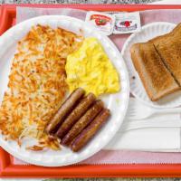 #1. Breakfast Special · 2 eggs, hash browns or grits, toast, jelly and choice of ham, 4 bacon strips or 4 sausage li...