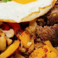 Short Rib Hash · braised grass fed short rib, potato, onions and peppers, two eggs of choice on top
