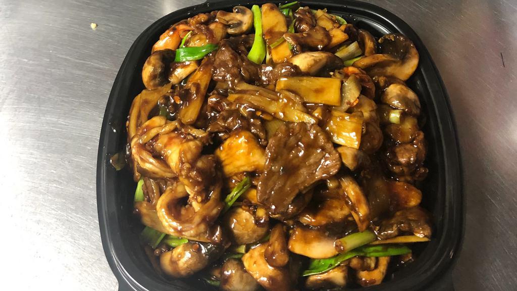 Mongolian Triple Delight · Spicy. Shrimp, chicken, and beef with green onion, mushroom, and bamboo shoots, stir-fried in spicy brown sauce.
