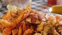 Sampler Platter · 6 shrimps, 3 fish, 2 wings and side of fries.