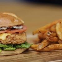 Crispy Chicken Burger · Chicken, lettuce, tomatoes, pickles, onions, cheese, Ali's sauce.