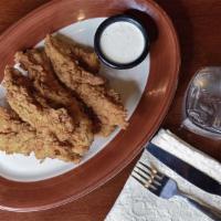 Boneless Chicken Tenders · Our light and flaky beer battered tenders with a choice of sauce: honey mustard, ranch, appl...