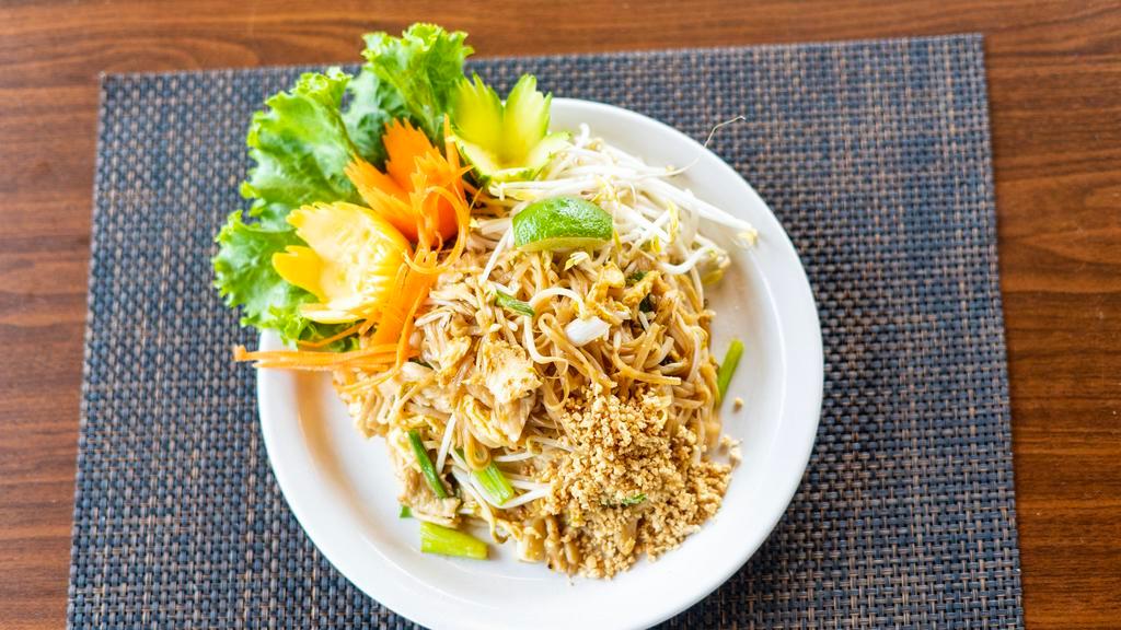 Pad Thai · Choice of meat, stir-fried rice noodles with egg, bean sprouts, and green onions topped with crushed peanuts, fresh bean sprouts and fresh lime.