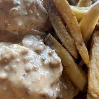 Biscuits-N-Gravy · Two housemade white cheddar, roasted garlic biscuits, rich house made sausage gravy, breakfa...