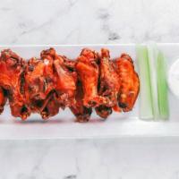 Wings · Boneless or regular. Hand tossed in your choice of sauce. Served with celery and bleu cheese...