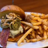 Jalapeno Juicy Lucy · 1/2 pound beef patty served on a large hamburger bun with jalapeno cream cheese, topped with...