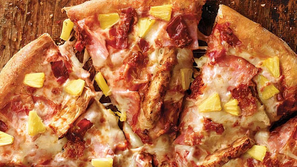 Medium Hawaiian Chicken Pizza · 8 slices. Ham, grilled chicken, bacon, pineapple, our signature sauce and 3-cheese blend.