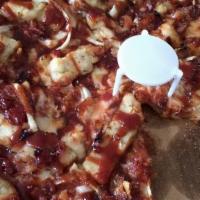 Extra Large Bbq Chicken Pizza · 12 slices. Grilled chicken, bacon, onions and our 3-cheese blend and topped with tangy BBQ s...