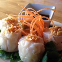 Shrimp Shumai · 4 piece - Steamed shrimp dumpling served with homemade sauce.