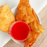 Crab Rangoons (4 Pieces) · Golden wrap filled with imitation crab meat, onions and cream cheese.