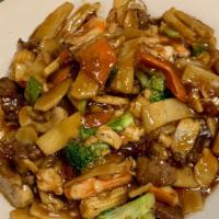 Triple Delight · Shrimp, chicken and beef stir fry with broccoli, water chestnut, mushroom, bamboo shoot and ...