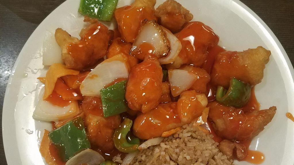 Sweet & Sour Chicken · Chunks of white meat breaded chicken with peppers, onions and carrots in sweet and sour sauce.